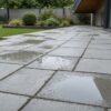 water pooling around outdoor paving
