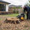 Professional stump grinding Melbourne service removing a tree stump from a residential backyard.