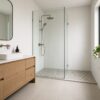 Best bathroom tiles in a modern Melbourne bathroom with porcelain floor and large wall tiles